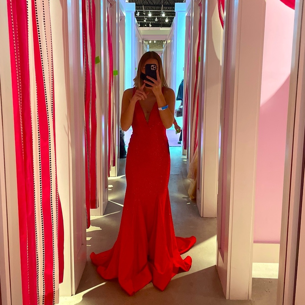 Prom dress worn one time, perfect shape nothing wrong with it. Beautiful dress!